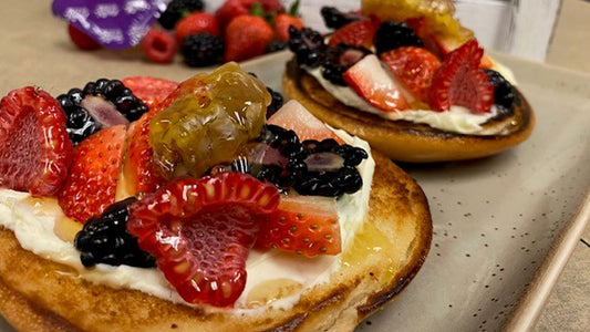 Bagel with Comb, Cream Cheese, and Berries
